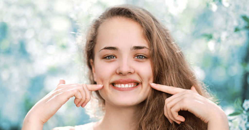 A girl showing her dimple